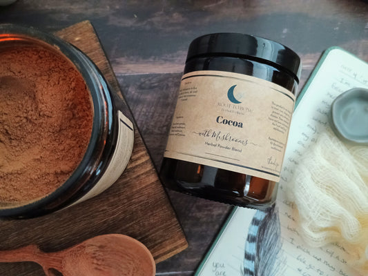 herbal cacao with reishi and turkey tail on a wood surface