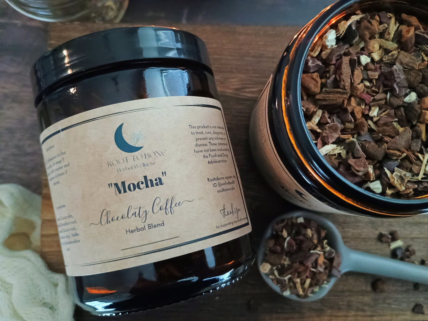 Jar of 'Mocha' herbal blend with a label on a wooden surface