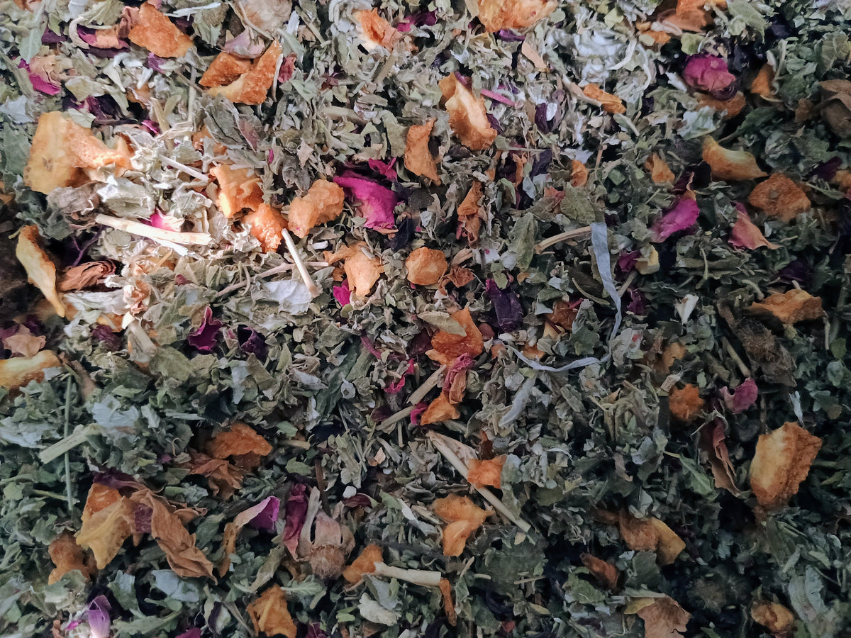 Close-up of a mix of dried herbs and flowers with various colors.