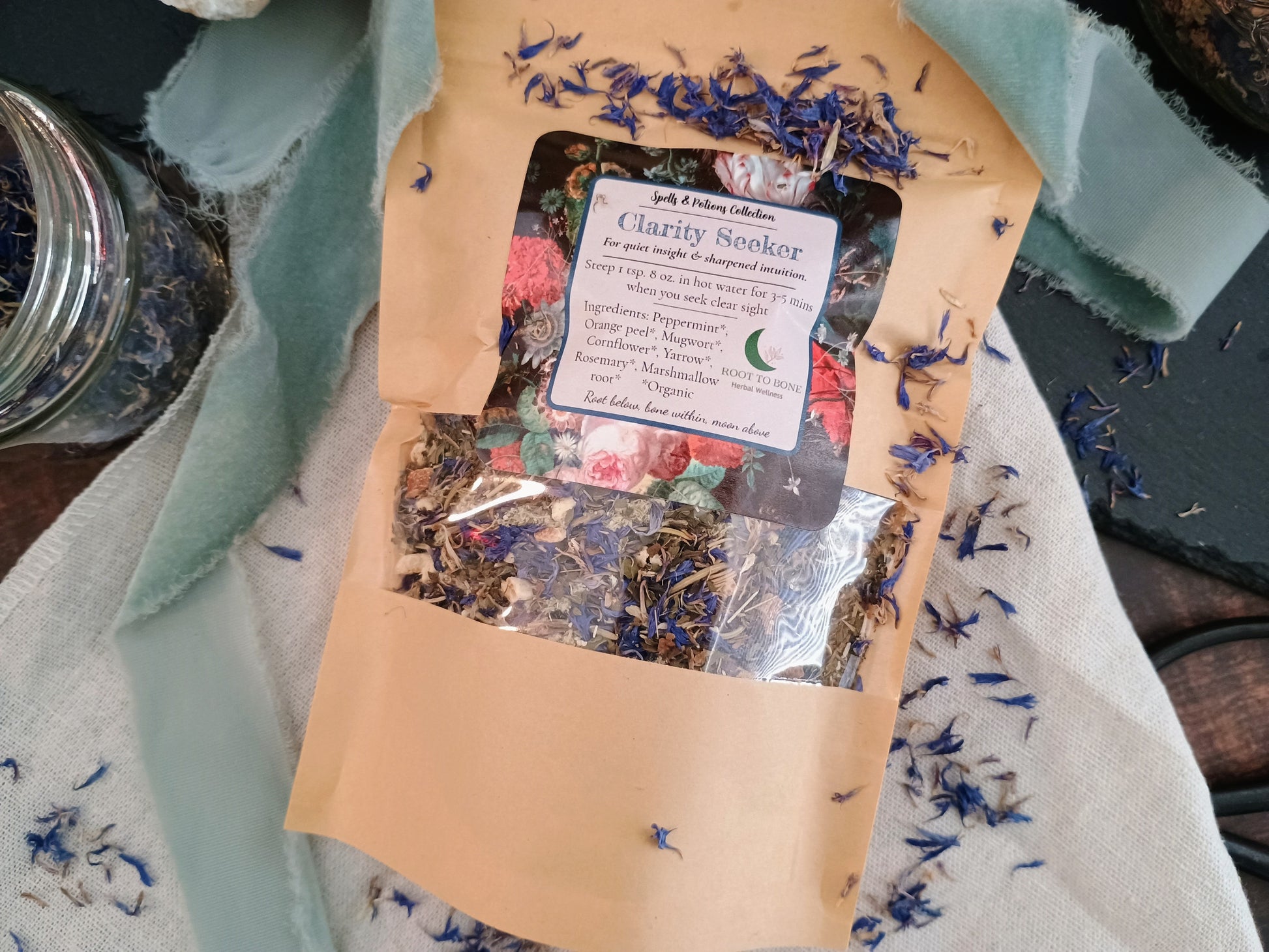 Herbal blend in a brown paper bag with a label on a textured surface