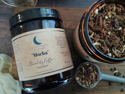 Jar of 'Mocha' herbal blend with a label on a wooden surface