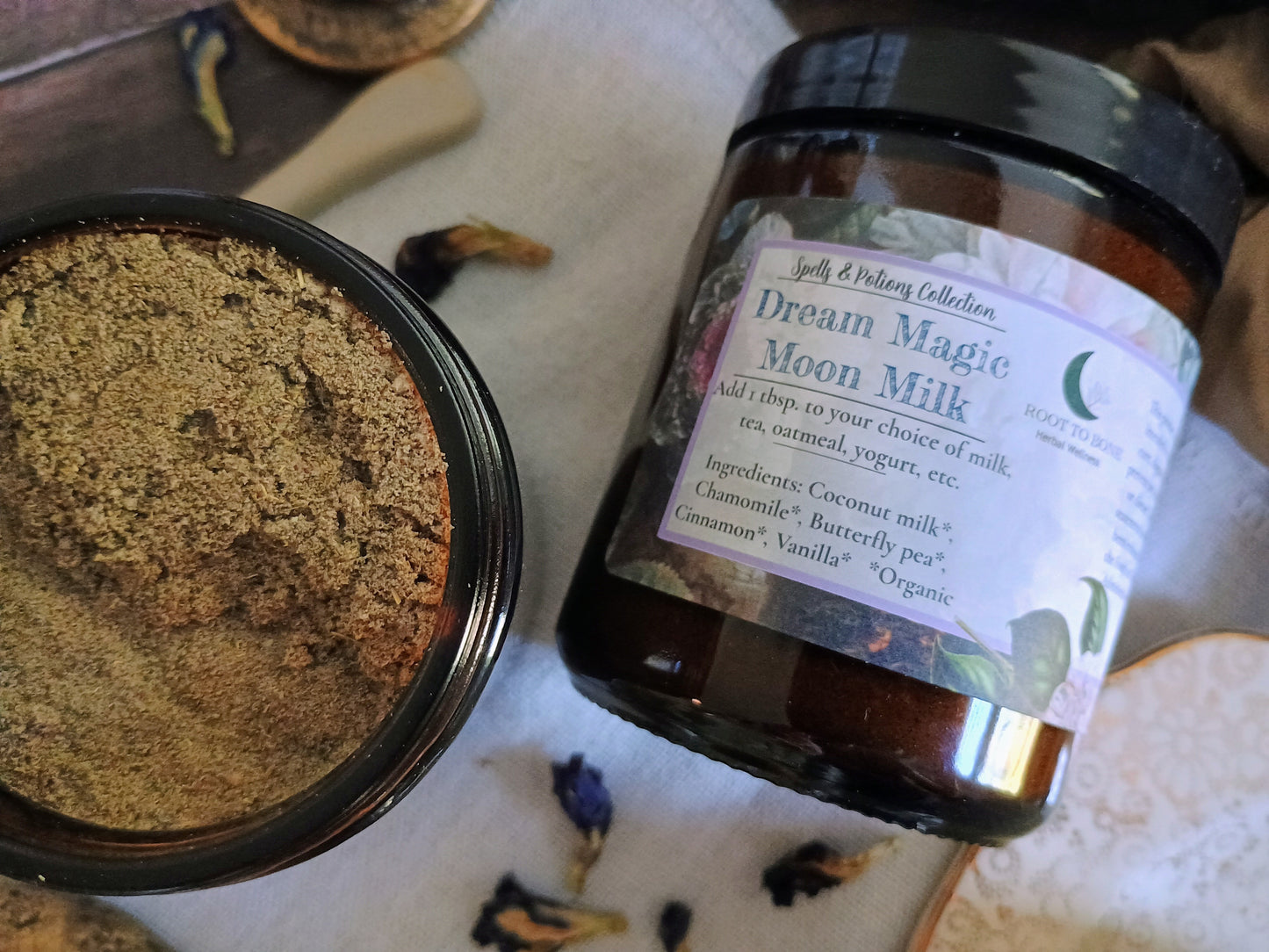 Jar of 'Dream Magic Moon Milk' with a label on a textured surface