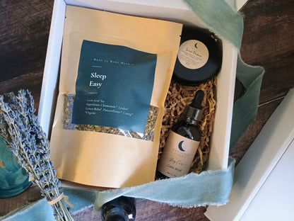 Gift set with 'Sleep Easy' tea, lavender, and other items in a box.