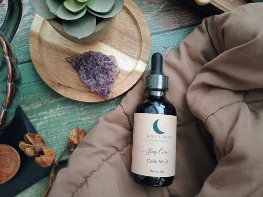 Bottle of 'Calm Mind' supplement on a textured surface with decorative elements.