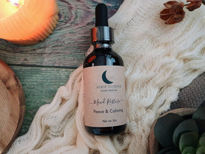 Bottle of 'Peace & Calming' herbal wellness supplement on a textured surface with decorative elements.