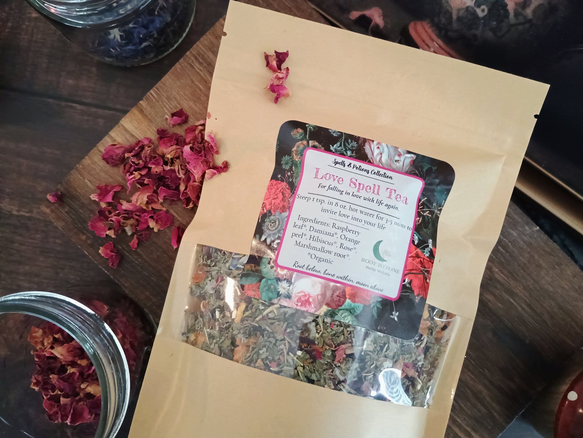 Love spell tea package with dried flowers on a wooden surface