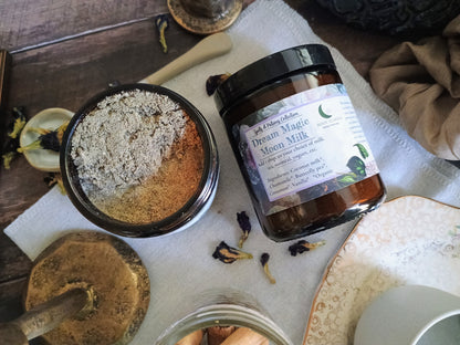 Jar of 'Dream Magic Moon Milk' on a wooden surface with natural elements.