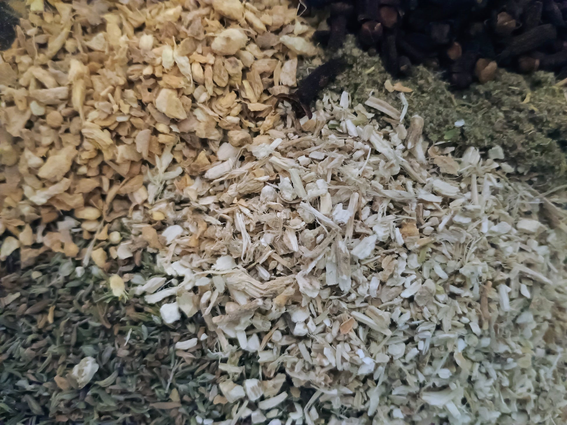 Close-up of various types of loose leaf herbal teas